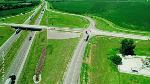 Towing truck pulls heavy duty semi truck on a bridge overpass. Repair shop concept. Indiana USA. photo