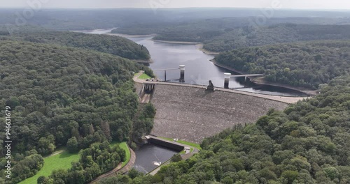 The Gileppe Dam, concrete dam wall, hydroelectric power plant, lake, infrastructure in the Belgium Ardennes, Belgian province of Liege, Jalhay and Baelen. Aerial drone video. photo