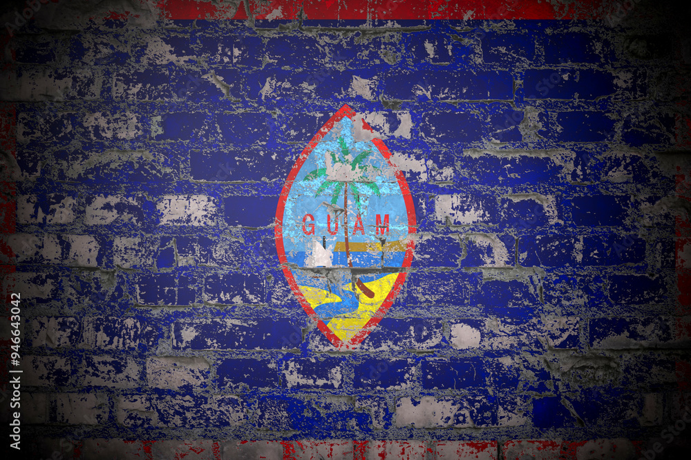 Obraz premium Flag of Guam on brick wall