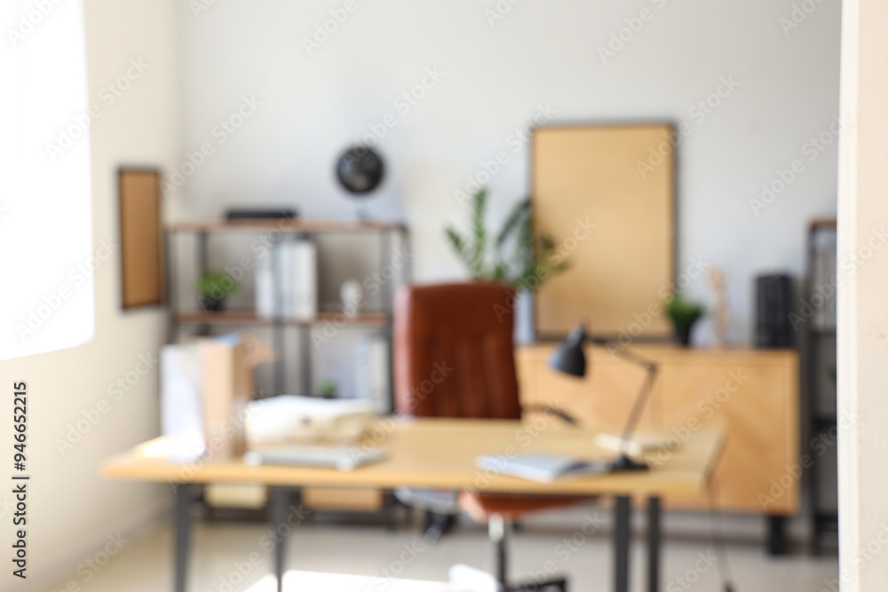 Blurred view of modern office with workplace Blurred view of modern office with workplace