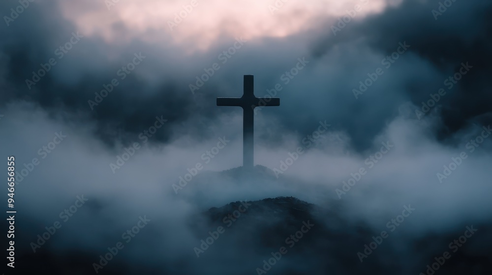 A serene silhouette of a large wooden cross emerging through dense fog at sunrise, representing faith, spirituality, and solemn beauty in a natural setting. A serene silhouette of a large wooden cross emerging through dense fog at sunrise, representing faith, spirituality, and solemn beauty in a natural setting.