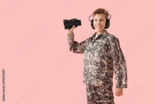 Teenage soldier with binocu...