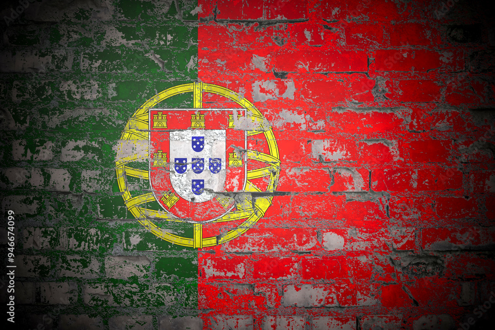 Fototapeta premium Flag of Portugal on brick wall