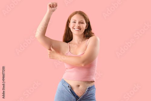 Happy young woman pinching ...