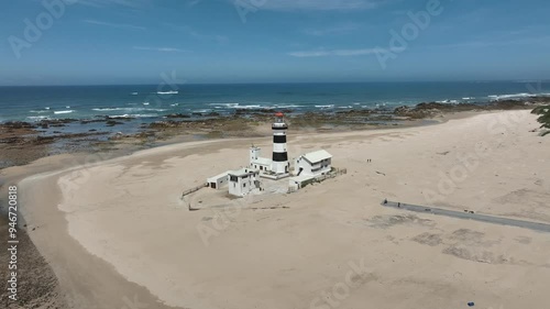 Aerial view of the beautiful Cape Receife with its iconic lighthouse and serene beach along the coastline, Port Elizabeth, South Africa.