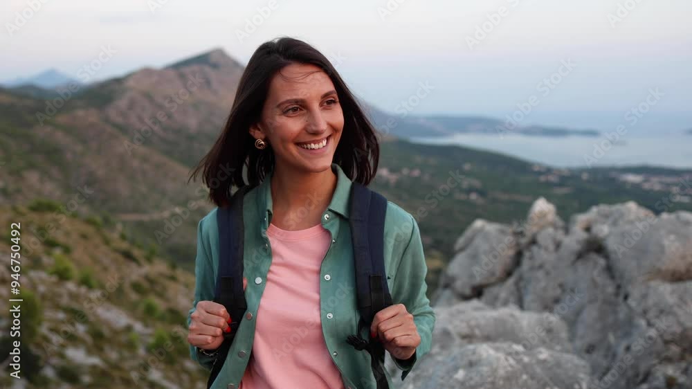 Woman enjoying hiking on the stunning mountain Woman enjoying hiking on the stunning mountain