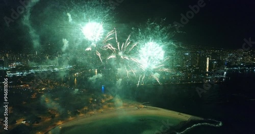 Wallpaper Mural Cinematic drone shot of aerial fireworks going off on Honolulu beach Torontodigital.ca