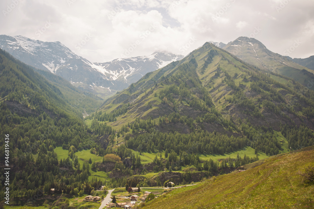 Fototapeta premium a view into the valley of the alpine landscape . view of the alpine valley in northern Italy.
