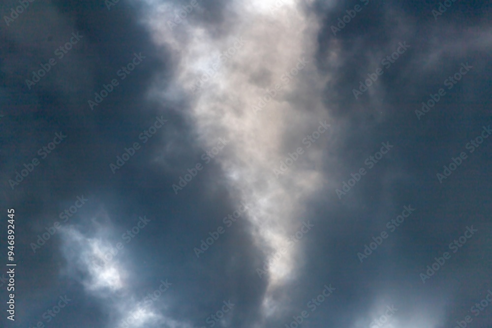 Obraz premium Moody Sky with Dramatic Cloud Illumination