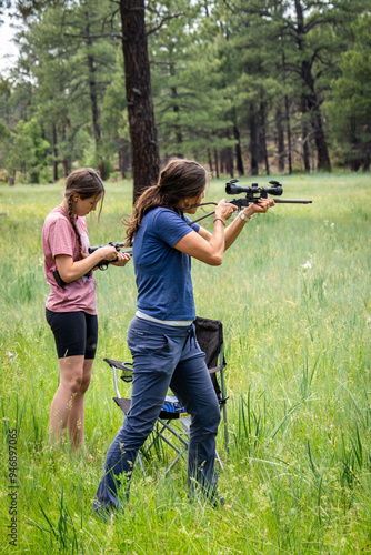  girl shooting a gun 