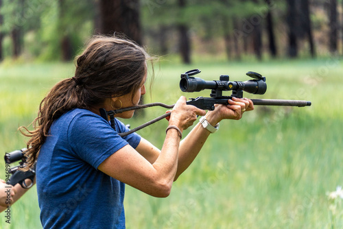  girl shooting a gun 