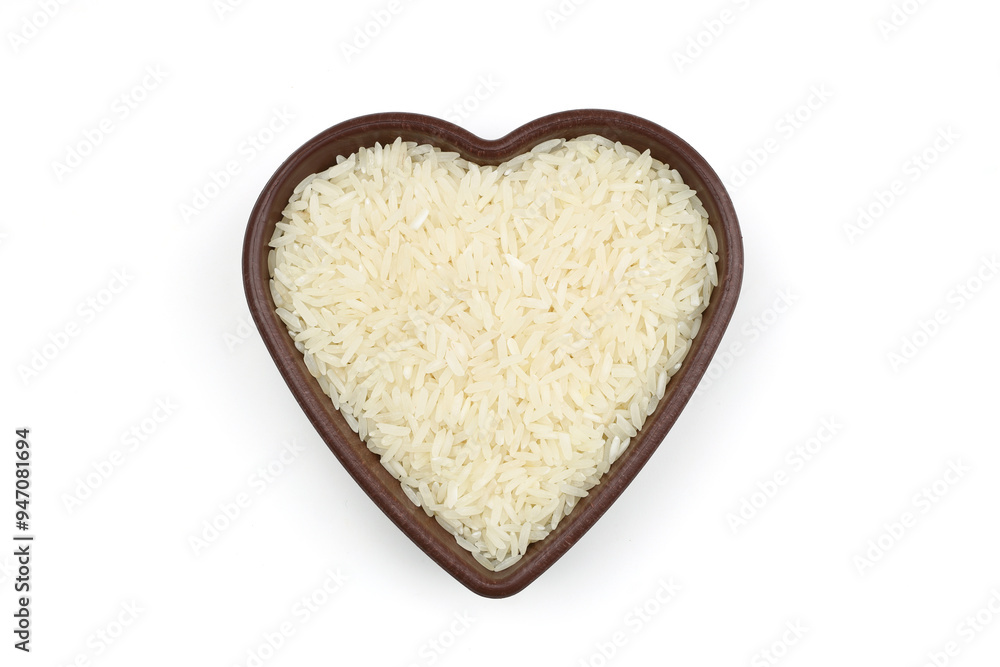 Raw white rice on wooden background. Long uncooked rice in wooden plate. Natural organic food. Traditional Asian cereal culture.
Raw white rice on wooden background. Long uncooked rice in wooden plate. Natural organic food. Traditional Asian cereal culture.