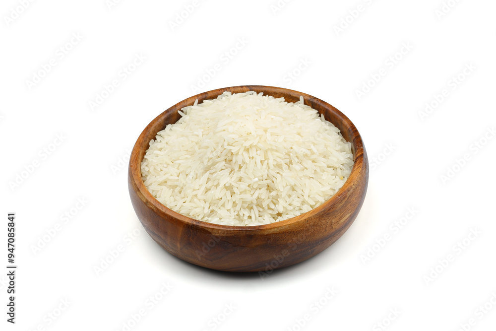 Raw white rice on wooden background. Long uncooked rice in wooden plate. Natural organic food. Traditional Asian cereal culture.
Raw white rice on wooden background. Long uncooked rice in wooden plate. Natural organic food. Traditional Asian cereal culture.