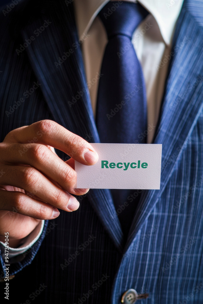 Business Man Holding Name Card with Recycle Symbol: Promote Sustainability in Corporate Environment | Eco-Friendly Initiatives | Green Business Practices | Environmental Awareness Stock Photo Business Man Holding Name Card with Recycle Symbol: Promote Sustainability in Corporate Environment | Eco-Friendly Initiatives | Green Business Practices | Environmental Awareness Stock Photo