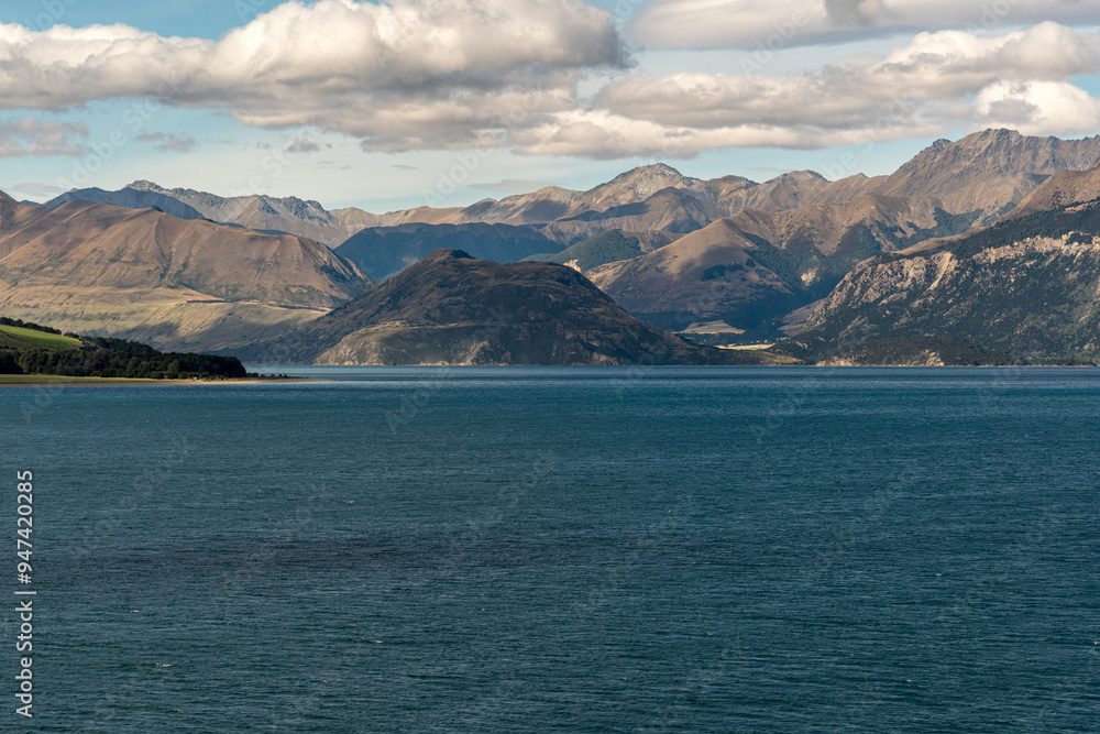 Lake scenery at the undeveloped alpine Lake Hawea Lake scenery at the undeveloped alpine Lake Hawea