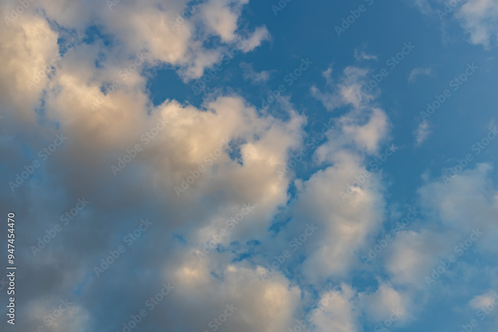 The sky is blue with a few clouds scattered throughout The sky is blue with a few clouds scattered throughout