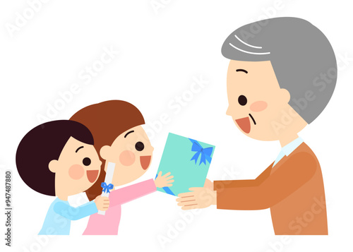おじいさんへ贈り物を渡す子供達