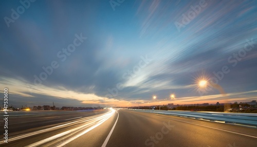 wide angle photo of a city road with a speed blur in the evening.horizon, car, speed, clouds, cloud, way, empty, drive, 