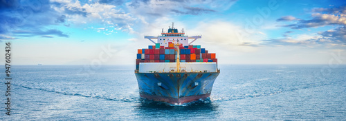 Obraz na płótnie Front view of a large container cargo ship sailing over the ocean as a banner for shipping and industry w salonie