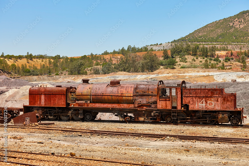 Rusty locomotive at Rio Tinto open cast mine. Andalusia, Spain Rusty locomotive at Rio Tinto open cast mine. Andalusia, Spain