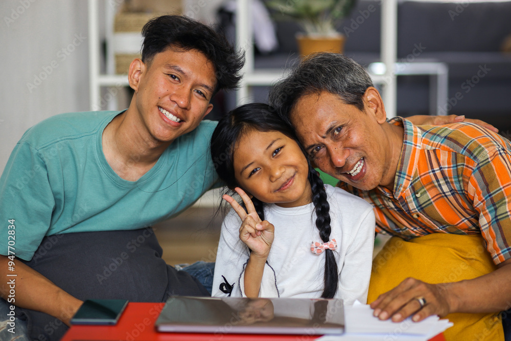 Close Up Of Happy Asian Family Smiling And Looking At Camera Close Up Of Happy Asian Family Smiling And Looking At Camera