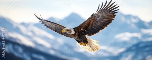 a majestic eagle soaring high above rugged mountains under clear skies.