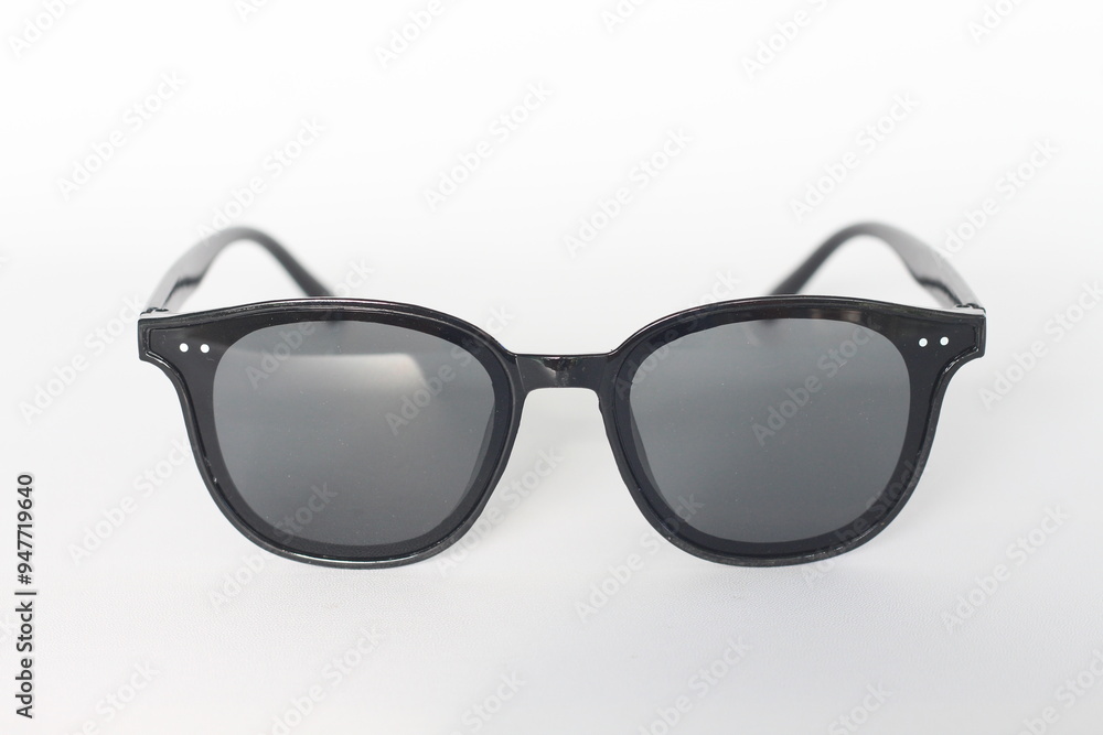 Stylish black sunglasses isolated on white background. Stylish black sunglasses isolated on white background.