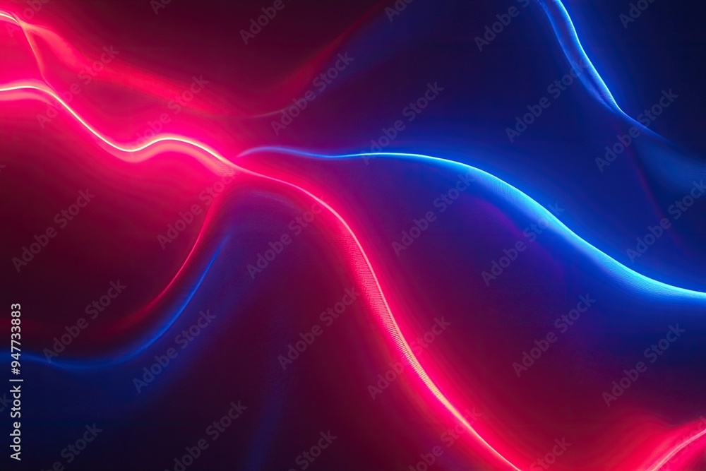 Vibrant wavy lines in red and blue create a dynamic and energetic background, perfect for technology and modern designs. Vibrant wavy lines in red and blue create a dynamic and energetic background, perfect for technology and modern designs.