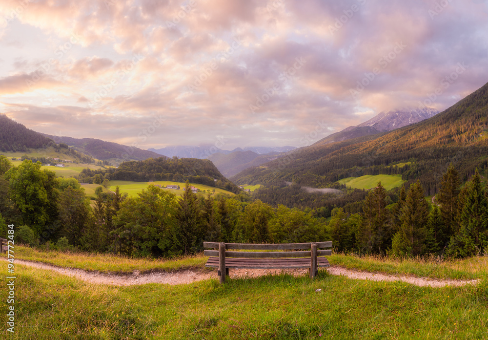 Meadow with road and bench during sunset in Berchtesgaden National Park Meadow with road and bench during sunset in Berchtesgaden National Park