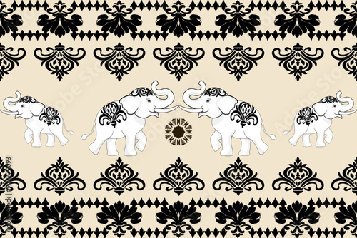 Four white elephants decorated with black abstract flowers on a light background.