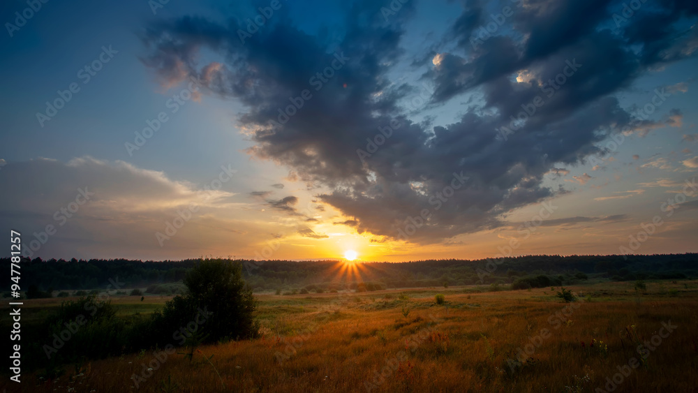 Sunrise over the forest on a summer morning. Sunrise over the forest on a summer morning.