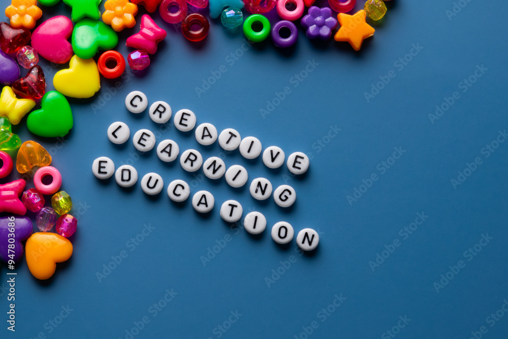 Assorted Beads spelling the words creative, learning and education Assorted Beads spelling the words creative, learning and education