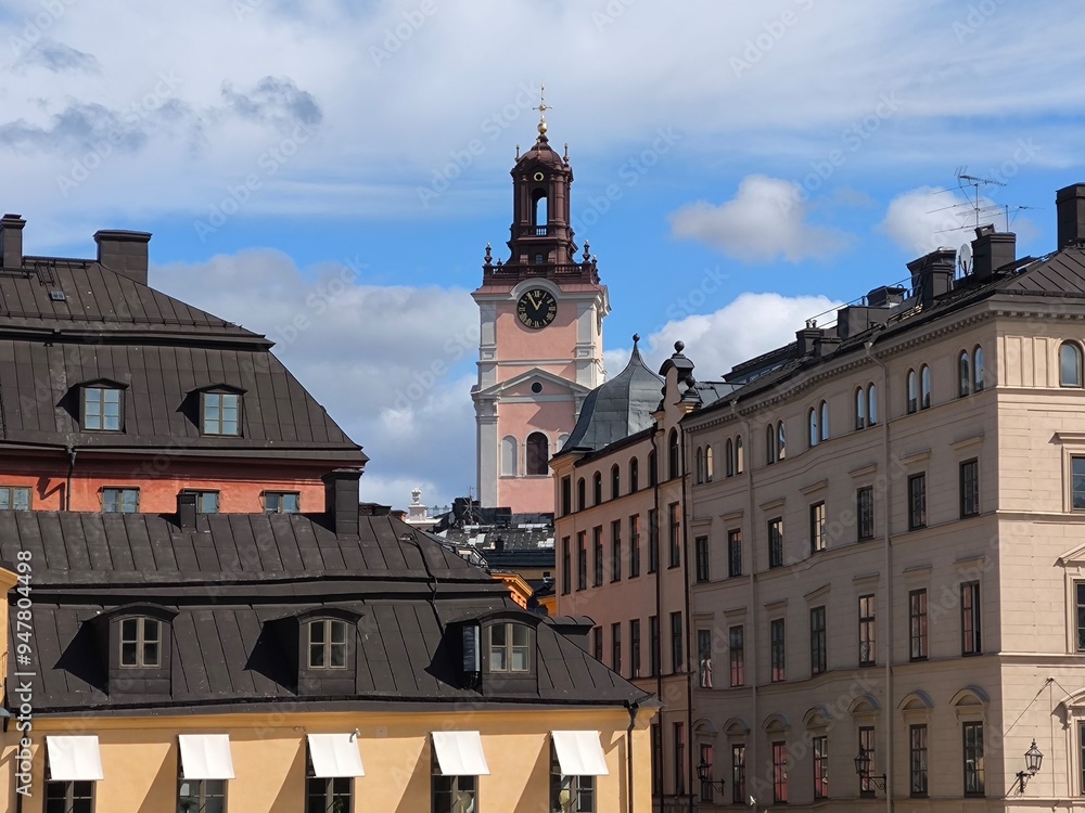 Fototapeta premium A street lined with colorful houses in Stockholm's historic Gamla Stan district, Sweden