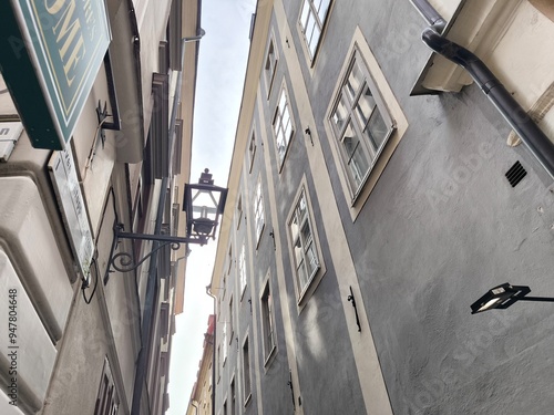 Photography A street lined with colorful houses in Stockholm's historic Gamla Stan district,