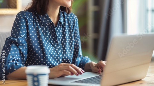 The woman typing on laptop