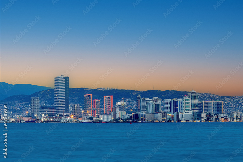 Bayraklı, Karşıyaka, İzmir, Turkey: August 20, 2024, view of the İzmir Bay from Karşıyaka at night. Long exposure, low light.