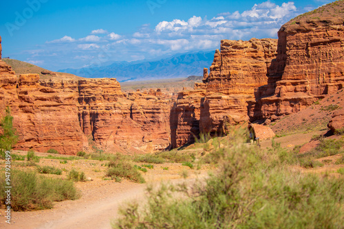 Charyn Canyon, Valley of Castles. The excellence of Kazakhstan. Panorama of natural unusual landscape. The red canyon of extraordinary beauty looks like a Martian landscape. photo