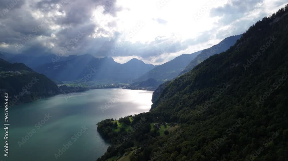 Lake Klöntalersee Glarus canton nature in Switzerland, Swiss Alps mountain valley Lake Klöntalersee Glarus canton nature in Switzerland, Swiss Alps mountain valley