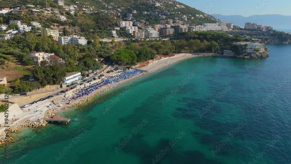 Vlora beach in albania with turquoise waters and coastal buildings , aerial view Vlora beach in albania with turquoise waters and coastal buildings , aerial view