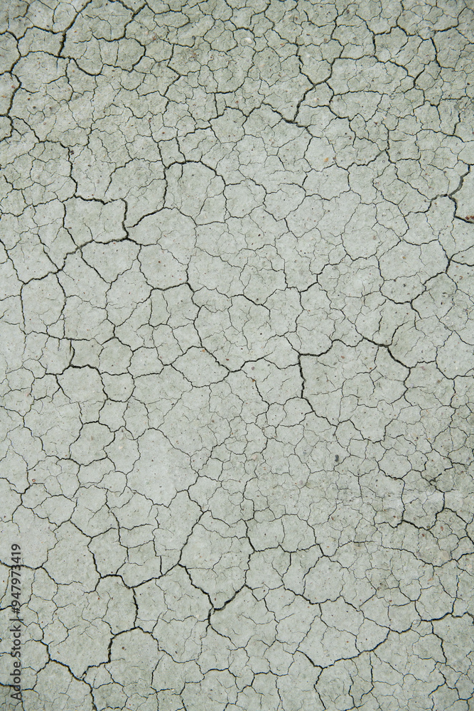 Soil cracked from thirst.Clay and sand texture of dried soil, close-up. Dried soil texture on Nallıhan Kız hill. Nallıhan Ankara, Türkiye. Soil cracked from thirst.Clay and sand texture of dried soil, close-up. Dried soil texture on Nallıhan Kız hill. Nallıhan Ankara, Türkiye.