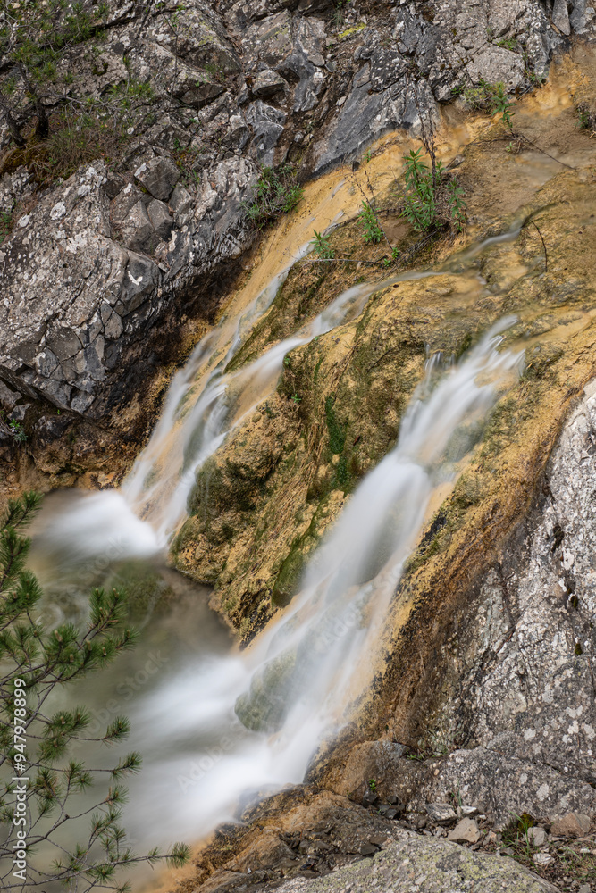 Small waterfall captured with long exposure. View of the waterfall taken from the top. Waterfall photo taken with long exposure technique. Nallıhan Ankara, Türkiye. Small waterfall captured with long exposure. View of the waterfall taken from the top. Waterfall photo taken with long exposure technique. Nallıhan Ankara, Türkiye.