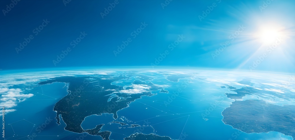 A breathtaking view of Earth from space, showcasing vibrant oceans, clouds, and the sun illuminating the planet. A breathtaking view of Earth from space, showcasing vibrant oceans, clouds, and the sun illuminating the planet.