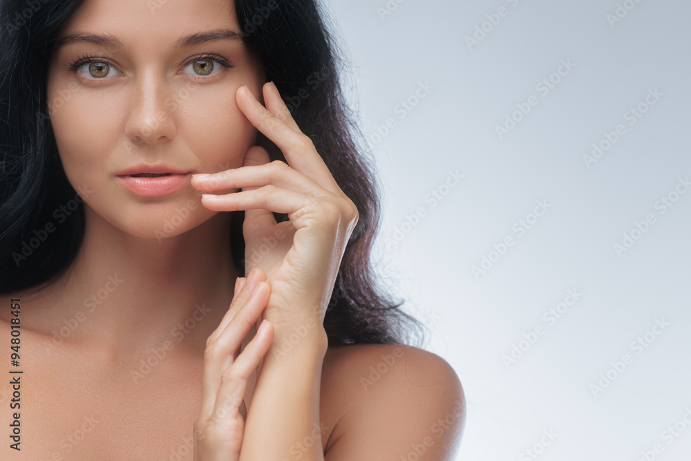 Portrait of Woman Touching Face for Skincare and Cosmetic Surgery Concept Portrait of Woman Touching Face for Skincare and Cosmetic Surgery Concept