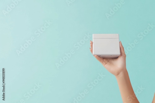 A model holding a high-quality digital scale against a solid color background, emphasizing its sleek design and precision.  photo