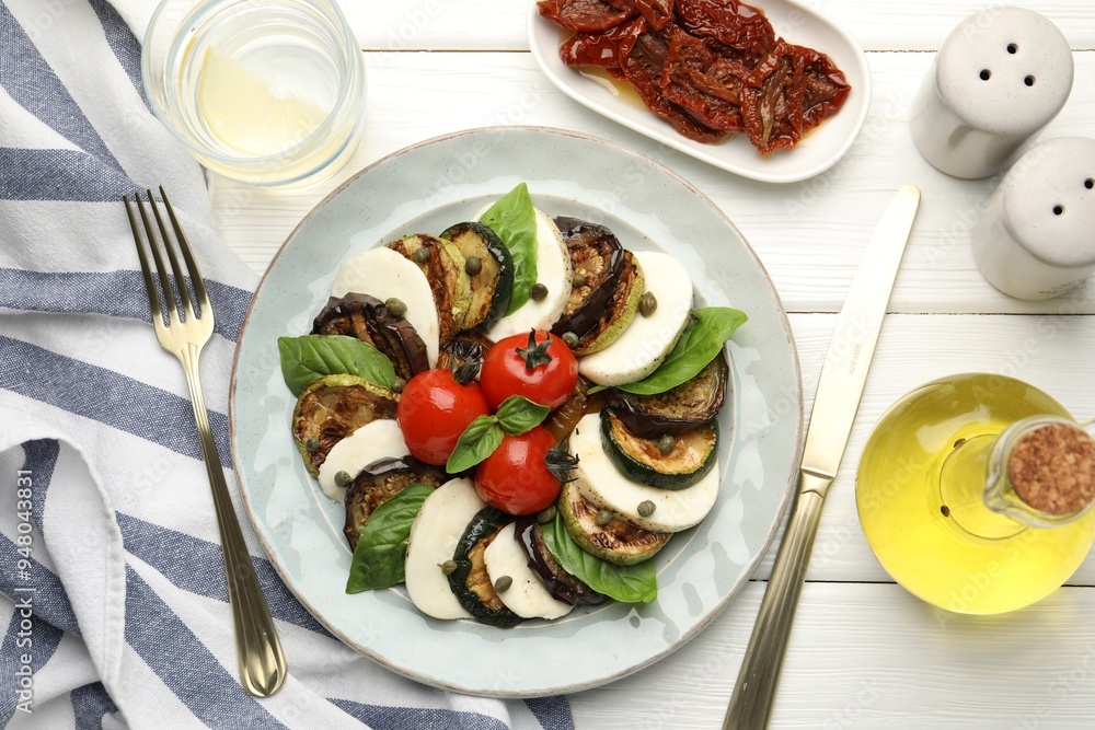 Tasty salad with grilled vegetables and mozzarella cheese served on white wooden table, flat lay Tasty salad with grilled vegetables and mozzarella cheese served on white wooden table, flat lay