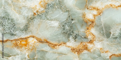 Natural marble surface with intricate patterns and golden veining found in a geological formation photo