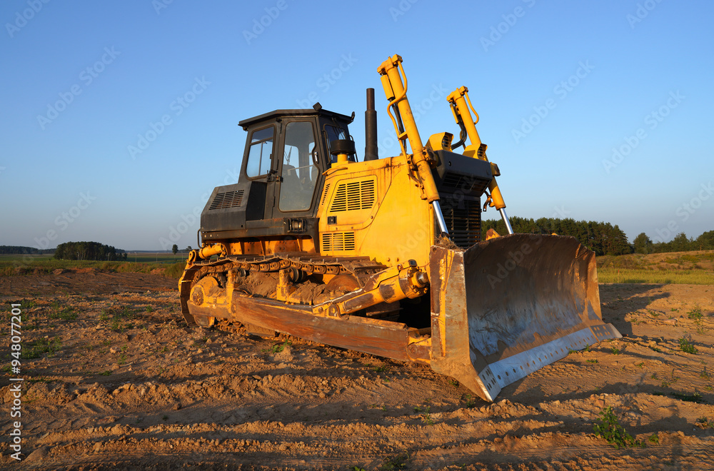 Dozer at construction site, utility trenching. Earth-moving machinery. Bulldozer at road construction. Earth-moving equipment at road work, land clearing, grading, pool excavation, utility trenching. Dozer at construction site, utility trenching. Earth-moving machinery. Bulldozer at road construction. Earth-moving equipment at road work, land clearing, grading, pool excavation, utility trenching.