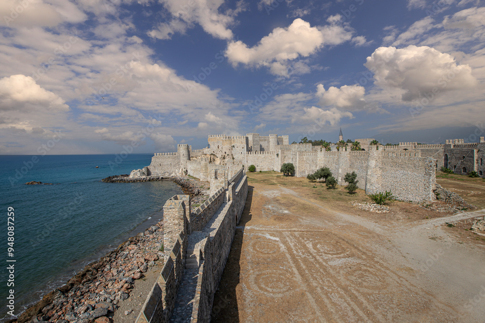 Stone walls of Mamure Castle on Mediterranean coast. Anamur, Mersin Province, Turkey.