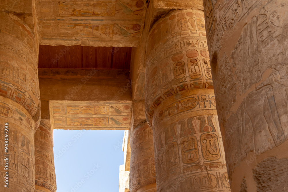 Explore the sacred Hall of Columns at Karnak, dedicated to the god Amun, and marvel at the intricate carvings and towering pillars that adorn this ancient Egyptian temple. Explore the sacred Hall of Columns at Karnak, dedicated to the god Amun, and marvel at the intricate carvings and towering pillars that adorn this ancient Egyptian temple.