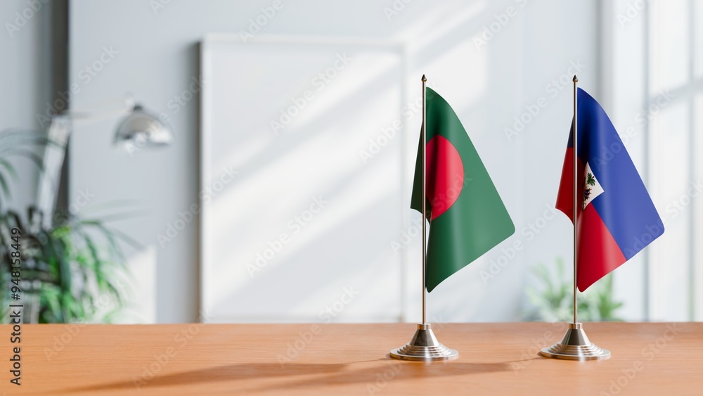 FLAGS OF BANGLADESH AND HAITI ON TABLE FLAGS OF BANGLADESH AND HAITI ON TABLE